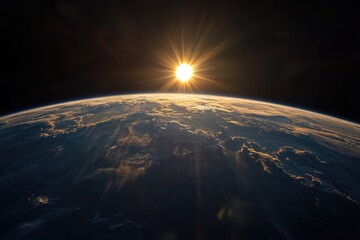 Wall Mural - earth and sun rising over its horizon, black background.