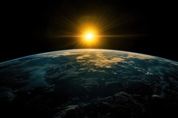 Wall Mural - earth and sun rising over its horizon, black background.