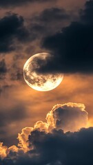 Wall Mural - Full moon behind dark clouds at sunset