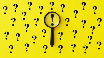 Poster - Searching for information, data, solution or answer for question. Magnifying glass on exclamation mark and question mark signs on yellow background