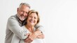 © Olga - Elderly couple hugging, smiling on a white background, great mood. Free space for text