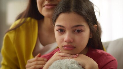 close up caucasian crying sad anxious depressed little girl child kid daughter cry upset by school p