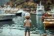 © vasyan_23 - Little explorer gazing at boats in a scenic harbor