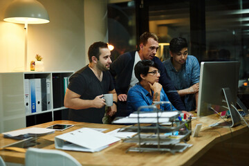 Poster - Business people, computer and collaboration at night for thinking, information technology and diversity. Research, programming and teamwork for problem solving, software development and cybersecurity