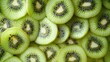 © nikomsolftwaer - A collection of sliced kiwi fruit, showcasing their vibrant green interiors and black seeds