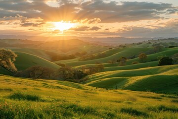 Wall Mural - A breathtaking sunset over rolling hills with vibrant clouds and golden sunlight illuminating the landscape in the late afternoon