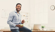 © Prostock-studio - Young happy black businessman eating salad at office, having healthy lunch at workplace, copy space