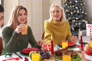 Poster - Mature woman having family dinner at home on Christmas eve