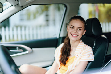 Canvas Print - Smiling woman in car, bright interior, casual outfit, enjoying the ride, feeling relaxed and happy Natural light, summer vibe, positive mood captured in the moment