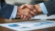 © A4719 - Business Partners Handshake Agreement Deal Contract Success