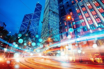 Poster - Night cityscape with towering skyscrapers and vibrant light trails from moving cars.