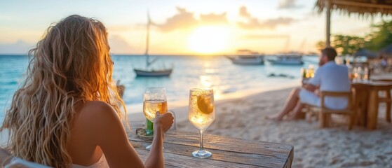 A serene beach scene featuring a woman enjoying a drink as the sun sets over calm waters and boats in the background.