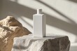 © Nuttapong - White Bottle Mockup on Stone Podium.