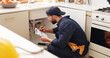 © WesLens/peopleimages.com - Plumber, house and handyman with checklist, maintenance and service with expert. Employee, contractor and repair with skills, inspection or quality control with industry, home renovation or clipboard