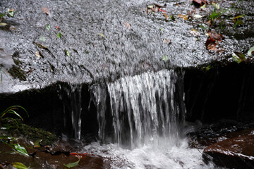 water flowing over rocks