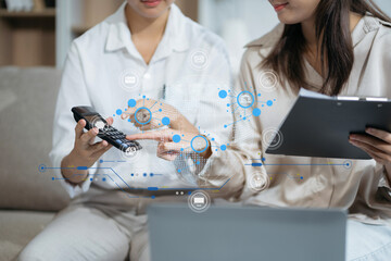 women doing finances and calculate on desk about cost at home office.