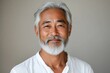 © Kevin - Portrait smile handsome senior mature Asian man isolated background, Generative AI