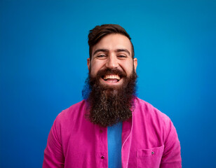 Wall Mural - Headshot Portrait of a Smiling Man with Contemporary Style, Isolated on Color Background with Ample Copy Space