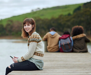 Aufkleber - Portrait, lake and woman with smartphone, connection and relax with adventure, smile and travel. Face, people and girl with cellphone, water and mobile user with social media, getaway trip or journey