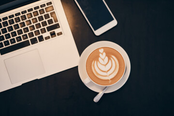 Aufkleber - Laptop, coffee and above with phone on table for online research, network and morning beverage. Technology, caffeine and mug with warm drink in restaurant for business, internet and freelance career