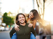 © SunriseDon/peopleimages.com - Piggyback, portrait or happy couple laughing in city to travel for relationship, love or tourism. Smile, outdoor and excited people in urban town street for vacation adventure or holiday in Sweden