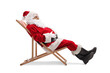 © Ljupco Smokovski - Santa claus sitting on a sun lounger