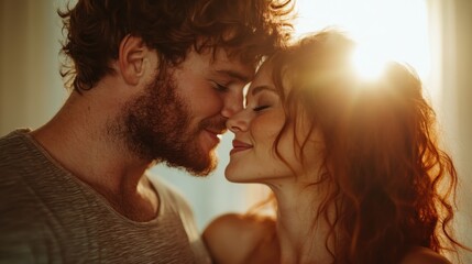 A couple embraces lovingly, illuminated by a golden sunset that casts a warm glow, representing love, happiness, and the beauty of a shared connection.