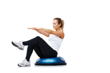 Aufkleber - Working hard to improve her fitness levels. A young woman sitting on a bosu-ball while exercising.
