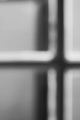 Wall Mural - a blurry dreamy close up of a door in black and white.