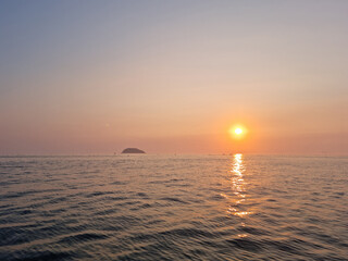 Wall Mural - It is a sunset sky and seascape.