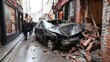 © Paul - A high-speed crash leaves a car's front end crushed into a brick building on a narrow city street. Surrounding stores and pedestrians visible in the background