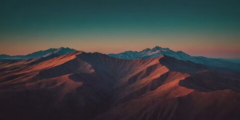 Poster - The mountains are covered in brown and green vegetation
