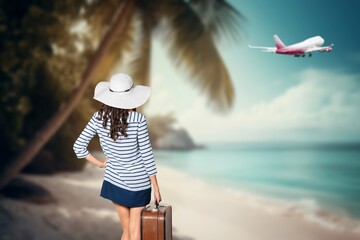 Wall Mural - Woman tourist with suitcase on beach, holiday