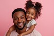 © Digi ART - Happy family moments. Cute black little girl sitting on father's shoulders, posing together and having fun on pink background, copy space, Generative AI