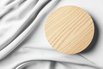 Poster - a minimalist wooden round surface atop smooth white fabric, showcasing texture and simplicity, perfe