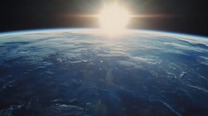 Wall Mural - a stunning view of earth from space, with the sun shining brightly in the distance.