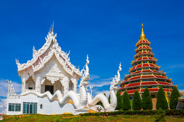 Landscape of Wat Huay Pla Kang, Chinese temple with blue sky background in Chiang Rai Thailand, This is the most popular and famous temple landmark in Chiang Rai.