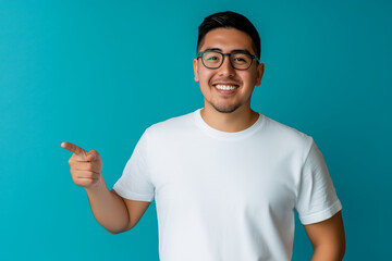 handsome middle-aged man, isolated on an empty blue background, with a smile, positive and confident expression, pointing his finger to the side, showing an idea, a concept, a success
