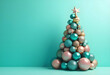 © PTD - festive Christmas tree made of colorful ornaments in shades of teal, pink, and gold, set against vibrant turquoise background, radiates holiday cheer and joy