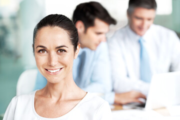 Wall Mural - Meeting, office and portrait of woman with confidence, smile or collaboration at finance agency. Teamwork, happy consultant or business people in conference room for workshop, opportunity or planning