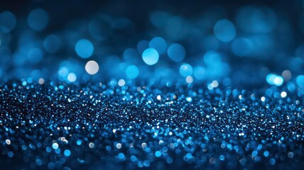 Wall Mural - abstract blue bokeh background with sparkling glitter.
