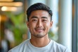 © James - Portrait of handsome Asian man smiling and looking camera with confidence, Generative AI