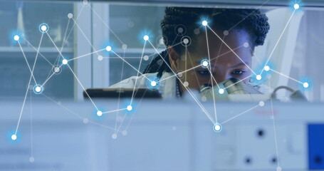 Aufkleber - image of network of connections over african american female scientist working in lab