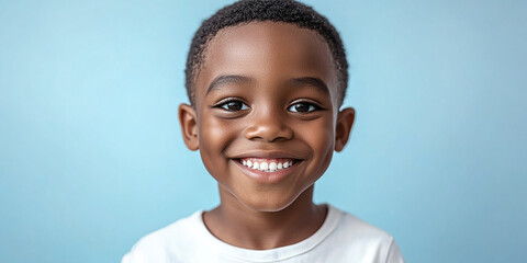 Black teenager boy on a studio background