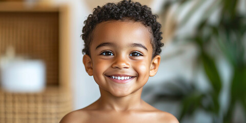 Black teenager boy on a studio background