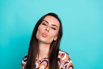 Canvas Print - Photo of cheerful pretty lady dressed retro shirt sending you kiss empty space isolated blue color background