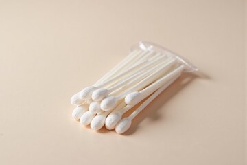 A pack of cotton swabs on a clean design background with a cozy feel