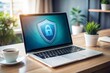 © Introvertia - Laptop with shield and lock icon representing digital security
