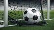 © Hosain - A soccer ball resting inside the net of a goalpost, captured right after a goal, with the net slightly stretched.