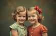 © Aksana - Two young girls with wavy blonde hair, wearing vintage outfits, posed smiling in studio setting, vertical photo40: vintage childhood, sisterhood, family moments, classic style, happiness